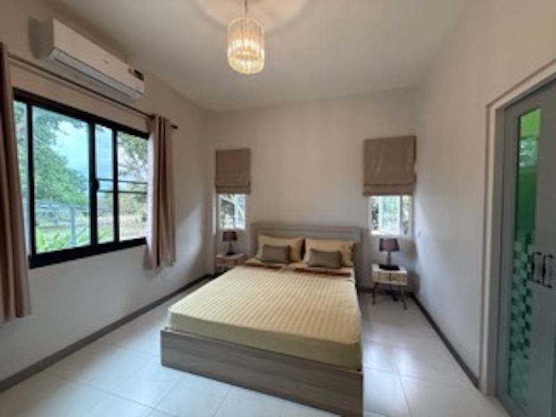 main bed and door en -suite bathroom Small